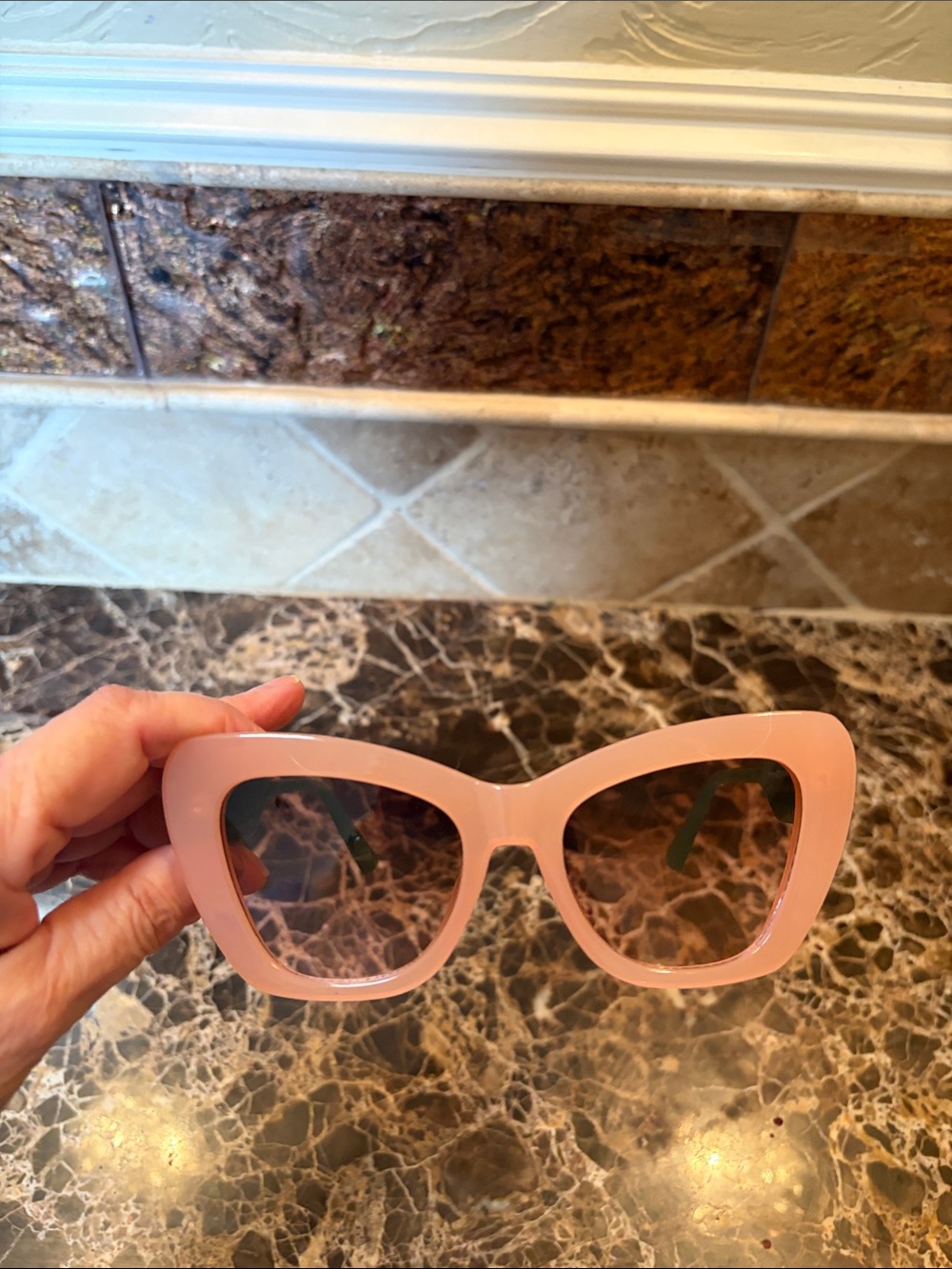 Pink Cat-Eye Women's Sunglasses with green handles